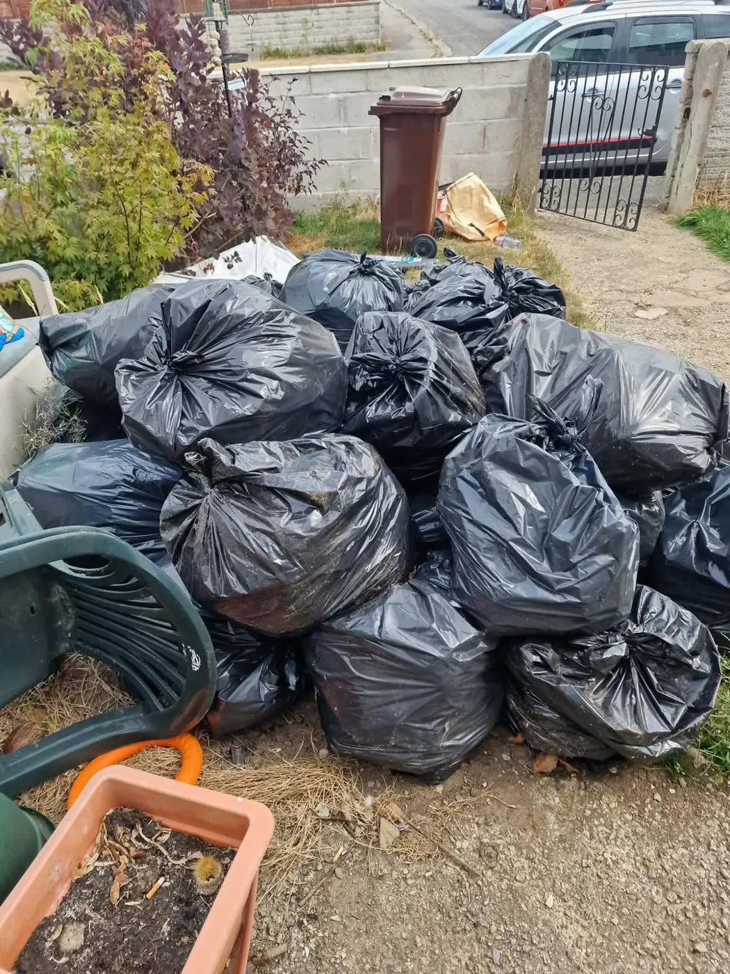 Large pile of rubbish bags before collection