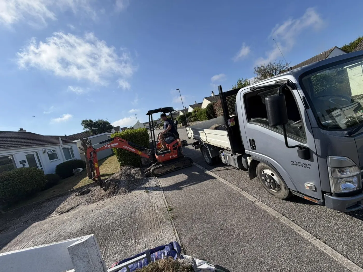 Mini digger and truck on a Cornwall clearance job