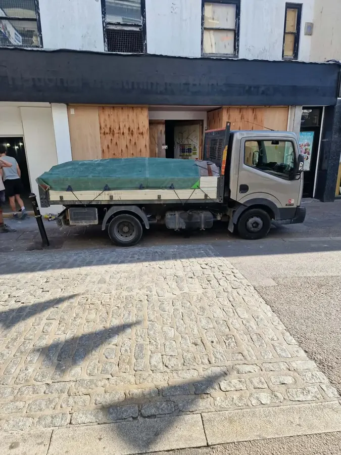 Empire vehicle outside a shop