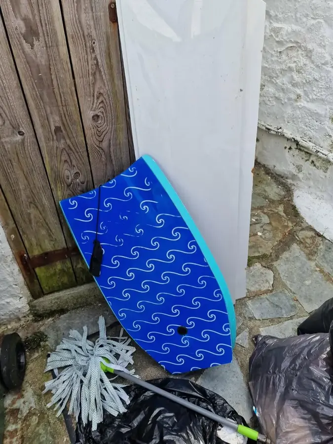 Household items and bagged rubbish